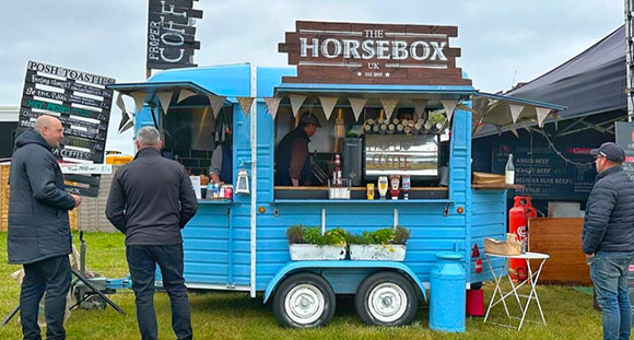 a coffee stand at a festival called The Horsebox